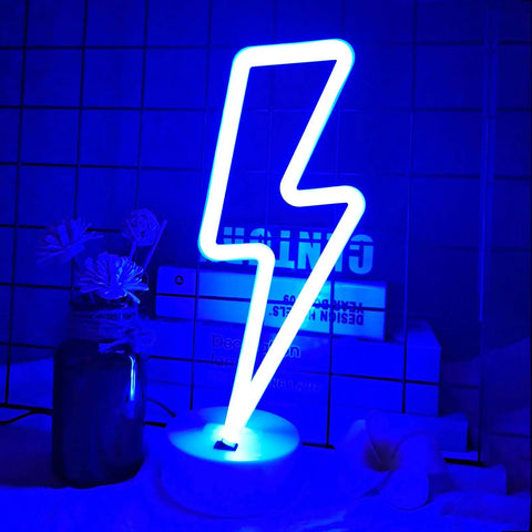 Lit Lightning Bolt Neon Sign With Base USB And Battery Powered Blue LED Light For Bedroom Decor on desk with flowers