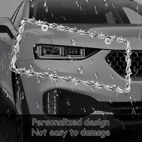 Car showcasing Edgy Barbed Wire Design License Plate Frame With Screws, Silver Chain Link Style Plate Frame, raindrops on surface.