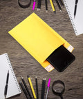 5 By 7 Inch Bubble Mailers 50 Pack Padded Envelopes Self Seal Kraft Paper Mailers with phone inside on wooden desk with stationery