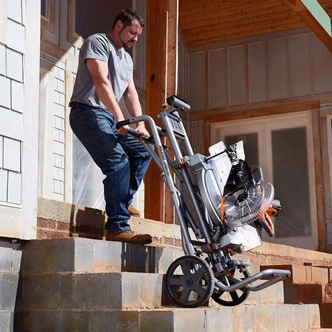 Man transporting Mobile Miter Saw Stand With Universal Mounting Brackets And Tool Free Extension Lock Quick Release For Fast Setup On The Go