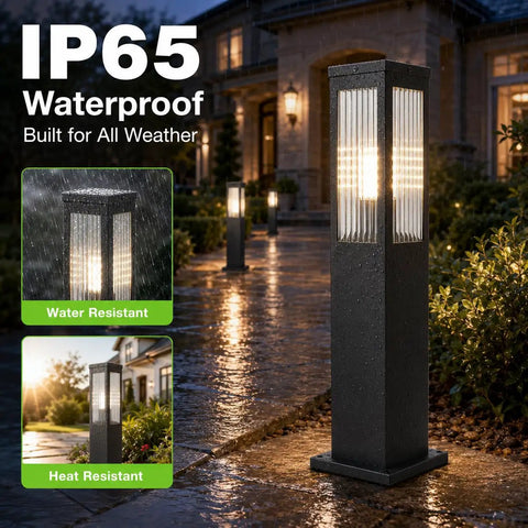 Slick Hardwired Outdoor Pathway Lights E26 Socket 23 Inch Tall black aluminum lamp with waterproof design illuminating walkway at night.