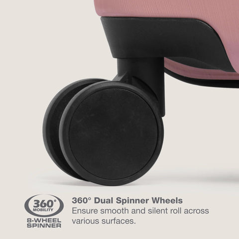 Luggage, rose-pink hardside travel case with two black dual-spinner wheels (close-up)