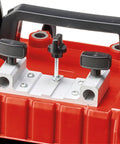 Close-up view of Built Tough Electric Wet Bench Grinder clamp mechanism with adjustable knobs for secure knife sharpening.