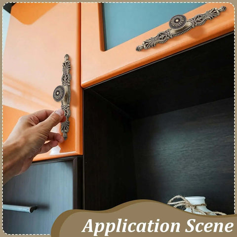 Person installing Antique Floral Cabinet Handles Set For Kitchen Cabinets, Bronze Vintage Door Pulls on orange cabinet
