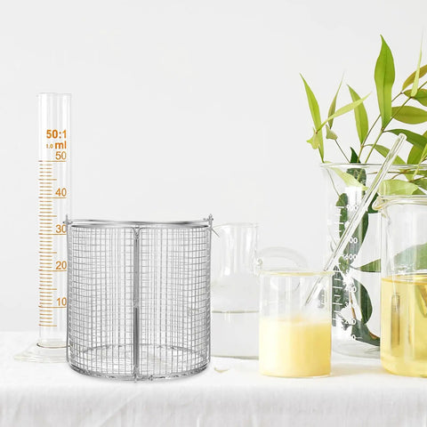 Heavy Duty Stainless Steel Parts Cleaning Basket With Sure Grip Swinging Handle For Ultrasonic Dip And Drain Runs in a lab setting.