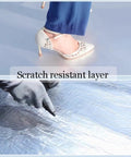 Rock Solid Self Adhesive Waterproof Membrane Roll shown being applied with scratch resistant layer protection on the floor.