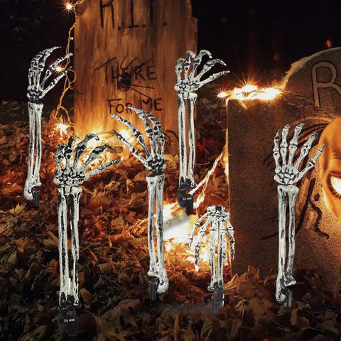 10 Pack Realistic Skeleton Arm Decorations For Garden And Lawn Halloween Decor graveyard stakes in nighttime display