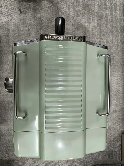 Top Shelf Green Espresso Machine With Integrated Burr Grinder And 15 Bar Pressure Pump, top view showcasing sleek design and finish.