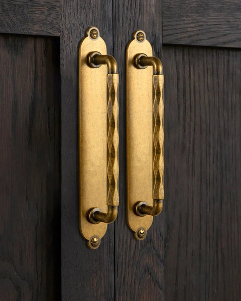 Five Inch Antique Brass Cabinet Pull Handles With Timeless Oval Backplates, Hella Durable Zinc Alloy Drawer Knobs For Kitchen Cabinets And Dressers, Rust Proof Two Pack Slick Smooth Handle Grip on dark wood.