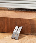 Heavy Duty Stainless Steel Bench Dogs Kit With 6 Clamping Dogs And 12 Screws for router sleds and panel flattening shown on wood