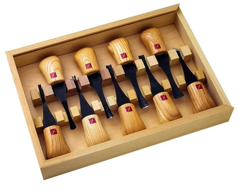4 Piece Super Wide Format Palm Set With Ergonomic Ash Handles And Pro Grade Razor Sharp 1095 High Carbon Blades Ready To Use Right Out Of The Box Comes In A Sturdy Wooden Toolbox Made In USA displayed in a wooden box.