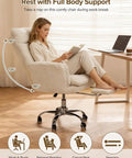 Woman lounging in Heavy Duty Office Chair With Footrest And Flip Up Armrests Ergonomic Desk Chair For All Day Comfort Reclining Gaming Style