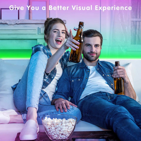 Couple enjoying LED TV Backlight Strip 32.8Ft USB Powered With Remote for 40 To 75 Inch TVs Behind The Screen Perfect For Bedroom Gaming Setup