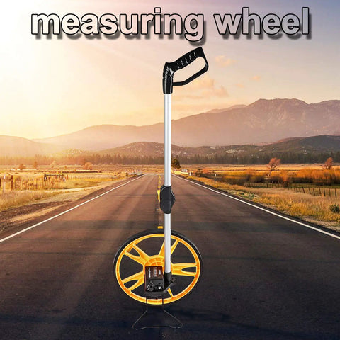 Badafaci Rolling Measuring Wheel, Foldable Handle on a road, featuring a durable yellow wheel and ergonomic black grip.