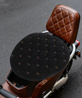 Top Shelf Comfort Plush Electric Scooter Seat Cover Winter Warm Black Stays Put Quick Strap Kit on a motorcycle seat.