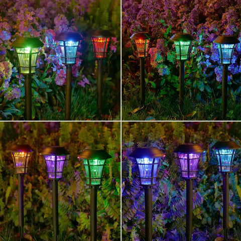 12 Pack Solar Pathway Lights With Cool Color Changing LED Landscape Lighting Waterproof Outdoor Garden Decor Auto On Off With 7 Color Options For Yard Walkway Driveway Patio And Lawn illuminating a garden scene.