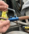 Person using Beefy Heavy Duty Pipe Extractor And Screw Extractor Set For Pipe Wrench And Faucet Removal on rusted pipe.