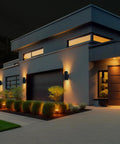 Modern home with Up And Down Outdoor Wall Light With Dusk To Dawn Sensor Pack Of 2 Matte Black Exterior Sconces illuminating facade