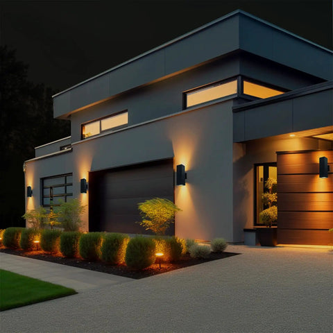 Modern home with Up And Down Outdoor Wall Light With Dusk To Dawn Sensor Pack Of 2 Matte Black Exterior Sconces illuminating facade