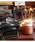 Powerful 1000W ZVS Induction Heating Plate Kit For DIY Projects with copper coil creating sparks, 100x100x85mm black board visible.