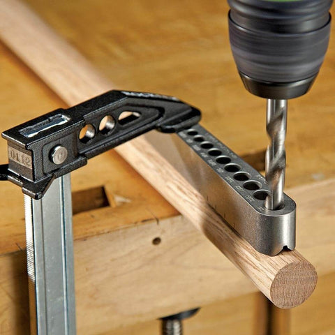 Universal V-Drill Guide For Perpendicular Hole Drilling On Flat Round And Square Materials clamped on wooden rod