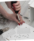 Person using screwdriver to install Stainless Steel Hinge Repair Plate Kit For Cabinets And Doors 10 Sets Easy To Use Quick Fix