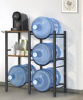 Heavy Duty Water Jug Rack With Shelf For Bottles, Space Saving Dispenser Storage Organizer shown with blue water jugs and coffee maker.