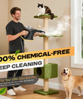 Man using Hot Handheld Steam Cleaner 1300W on cat tree for deep cleaning while a dog watches, showcasing powerful steam action.