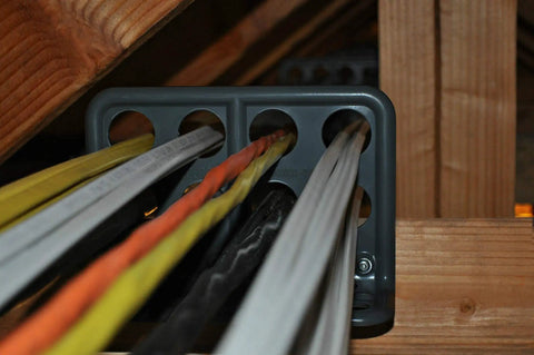 Box Of Fifty H2 Homer Helpers For Electrical Wire Management. UL Listed Cable Brackets holding multiple cables within studs.