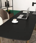 Matte Black Peel And Stick Wallpaper Roll Thick Self Adhesive Renter Friendly Wall Covering on desk surface in office setting