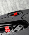 Close-up of NexStrip Multi Tool for Electricians With Non Slip Plastic Grips precise wire stripping adjustment dial.