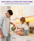 Father and daughter in kitchen with LED Strip Lights Warm White 3000K, 16.4ft high density tape light illuminating cabinet