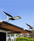 JUDYSSY Spot Lightingsolar Street Light, Led Dusk to N Solar Outdoor Light Lamp mounted on a roof with solar panels, for garden.