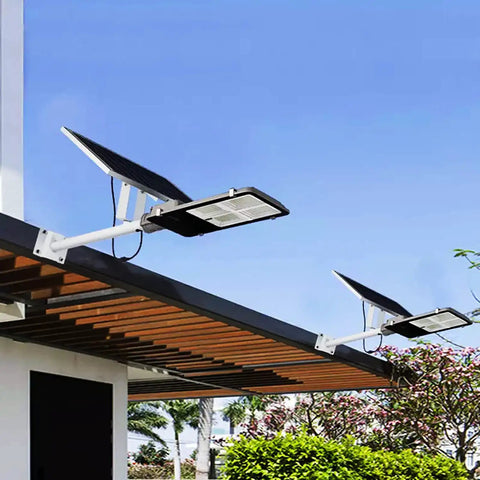 JUDYSSY Spot Lightingsolar Street Light, Led Dusk to N Solar Outdoor Light Lamp mounted on a roof with solar panels, for garden.