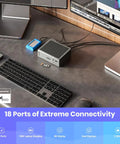 Next Level Thunderbolt 4 Dock Packing 18 Ripping Fast Ports Delivers 98 Watt Juice Powers Flawless 8K Dual Monitors And Boasts Blazing Ethernet For Mac And Windows on a desk with monitors and keyboard.