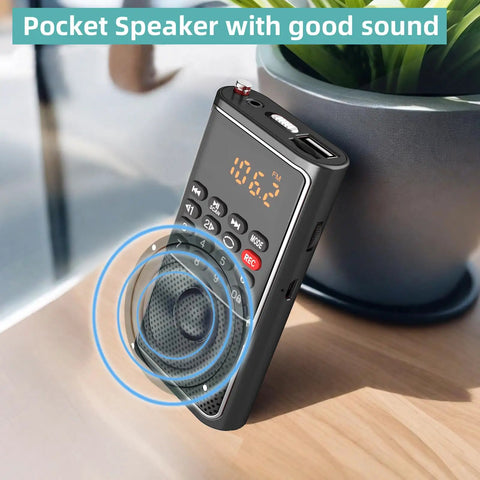 Pocket Mini FM Radio And MP3 Player With USB TF Card Support showing frequency display and control buttons on table
