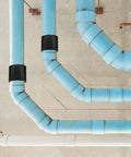 Heavy Duty Silicone Hose Coupler Connector Hydraulic Systems Black Rubber Fitting Durable Easy Install Swap Out Secure Connection on blue pipes