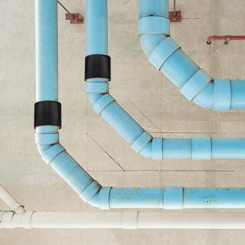 Heavy Duty Silicone Hose Coupler Connector Hydraulic Systems Black Rubber Fitting Durable Easy Install Swap Out Secure Connection on blue pipes