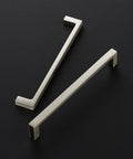 Solid Six And One Quarter Inch Square Cabinet Handles In Brushed Nickel, 25 Pack Drawer Pulls for kitchen cabinets, shown in pair.