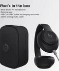 Studio Pro Premium Wireless Over Ear Headphones With Up To 40 Hour Battery Life And Active Noise Cancellation Crystal Clear Calls Great For Travel And Commute USB C Lossless Audio Apple And Android Compatible Black, shown with carrying case and cables.