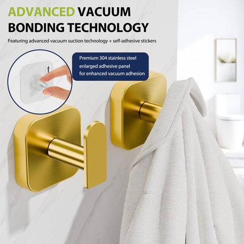 Heavy Duty Self Adhesive Wall Hooks Built Different, Stainless Steel Sticky Towel Holder With Knockout Grip For Bathroom Shower Or Kitchen, Hang Heavy Coats Without A Sweat, Gold Finish, 2 Pack on a wall with a towel hanging.