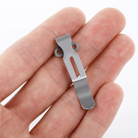 Top Shelf 13 Piece Titanium Screw Kit For Benchmade Bugout 535 Repair With T10 Torx Pivot Bolts And T6 Body Fasteners, titanium clip held in hand.