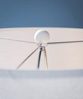 Close-up of the Claiborne Floor Lamp With Gloss White Finish For A Clean Modern Vibe, showing the lampshade's top fixture detail.