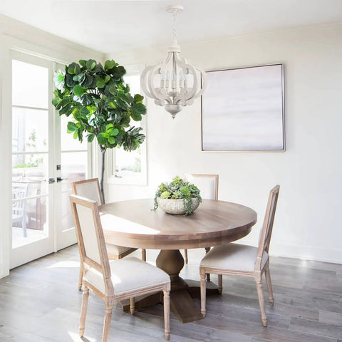 Farmhouse 5 Light French Country Wood Chandelier For Dining Room And Kitchen Island in bright dining space.