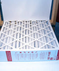 Replacement Media Air Filter FC100A1011 MERV 11 20x20x4 Pack Of 2 displayed in packaging on a shelf.