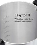 Interior view showing water level marks of the Party Ready 45 Cup Coffee Urn And Hot Beverage Dispenser With Fast One Minute Per Cup Brew Crowd Friendly For Parties And Family Reunions Easy Two Way Serving Sleek Silver Finish.