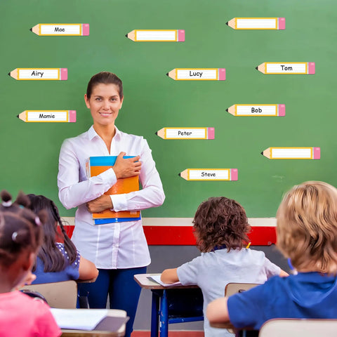 Teacher in classroom with 36 Pack Magnetic Dry Erase Name Tags 7.8 x 1.57 Inches Reusable Erasable Pencil Labels on chalkboard