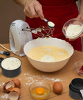 Person using Measuring Cups And Spoons Set Nesting Stackable With Stainless Steel Handles For Cooking And Baking, Rust Resistant Kitchen Gadgets