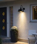 Illuminated door with Gooseneck Barn Lights Outdoor Dusk to Dawn Sensor for Porch and Garage Black Exterior Farmhouse.