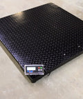 Heavy Duty Industrial Floor Scale 40 X 40 Inch Platform Scale Holds Up To 5000 Pounds One Pound Resolution on warehouse floor.